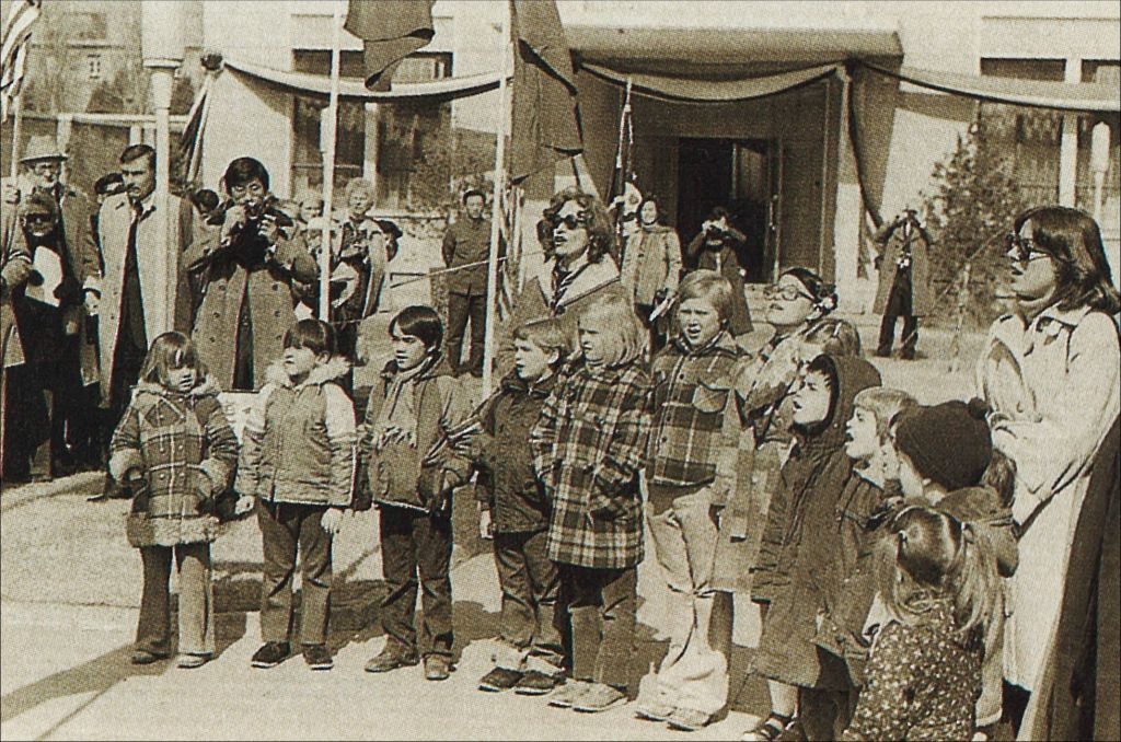 Children of Liaison Office staff await Cokes and firecrackers. Courtesy of the author.