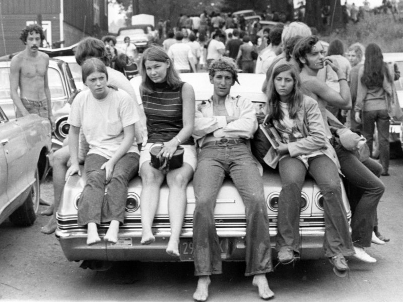 Woodstock attendees catch a breather at the conclusion of the festival on August 18, 1969. Photo by Ric Manning
